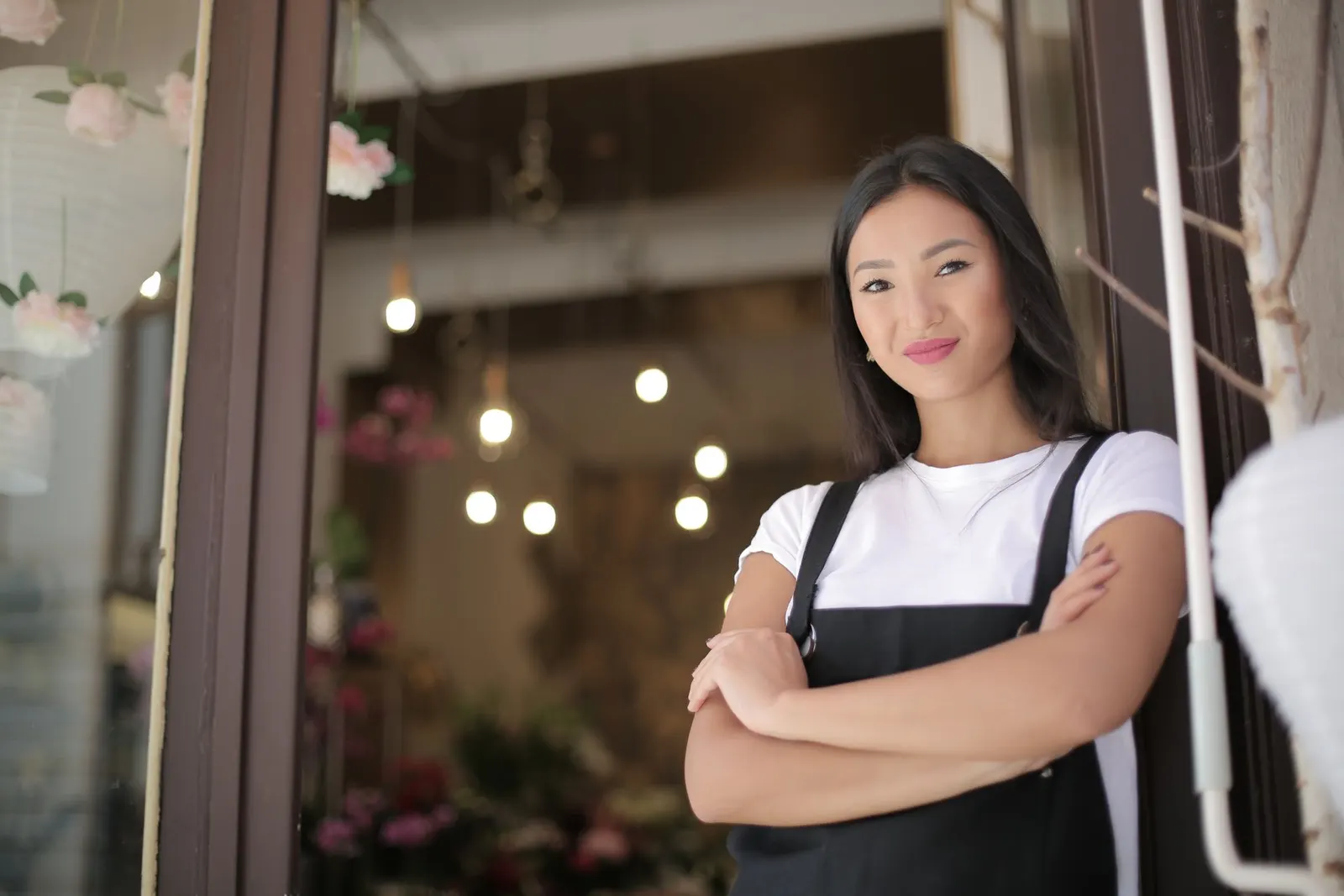 Florist at her shop entrance